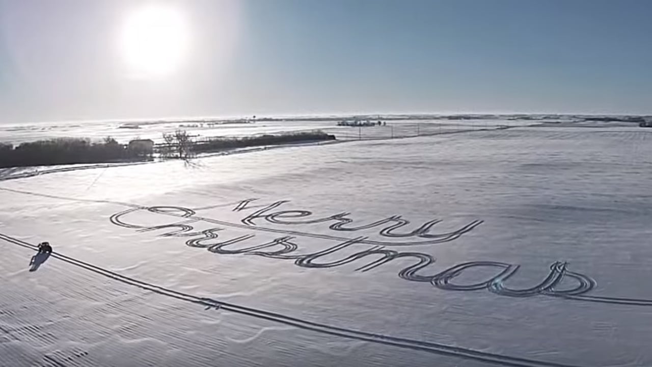 Video: Farmer creates ‘Merry Christmas’ in snow with tractor
