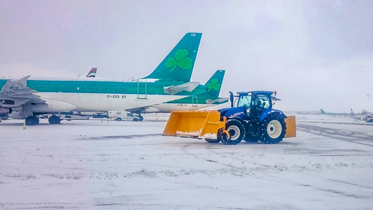 41 New Holland tractors battle today’s snow…at Dublin Airport