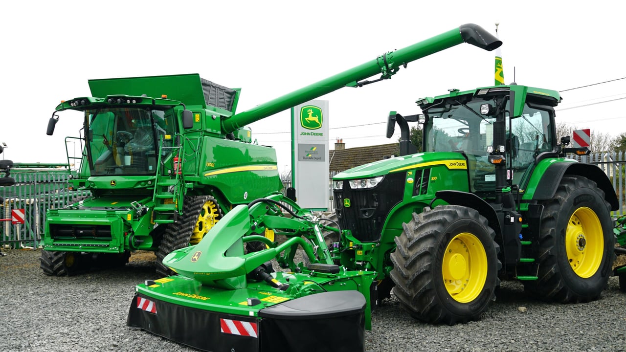 John Deere cuts production and jobs as sales fall