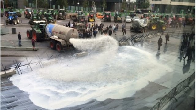 Tankers spray 40,000L of milk over EU buildings in Luxembourg in protest