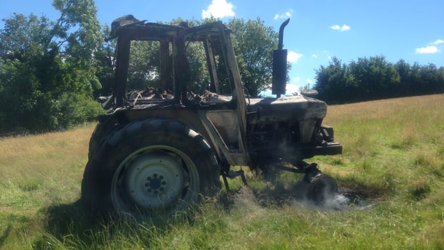 Contractor has lucky escape as tractor goes on fire in hay field