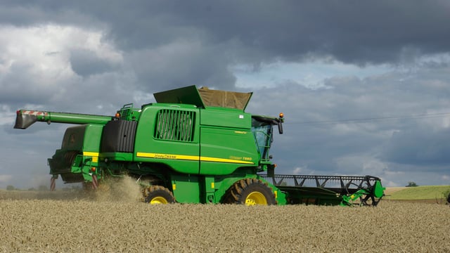 John Deere self-propelled  combines celebrate 75 years