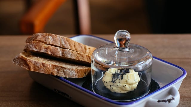 Sainsbury’s cuts own-brand bread and butter prices