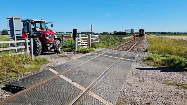 Tractor collides with train carrying 40 people in Lancashire